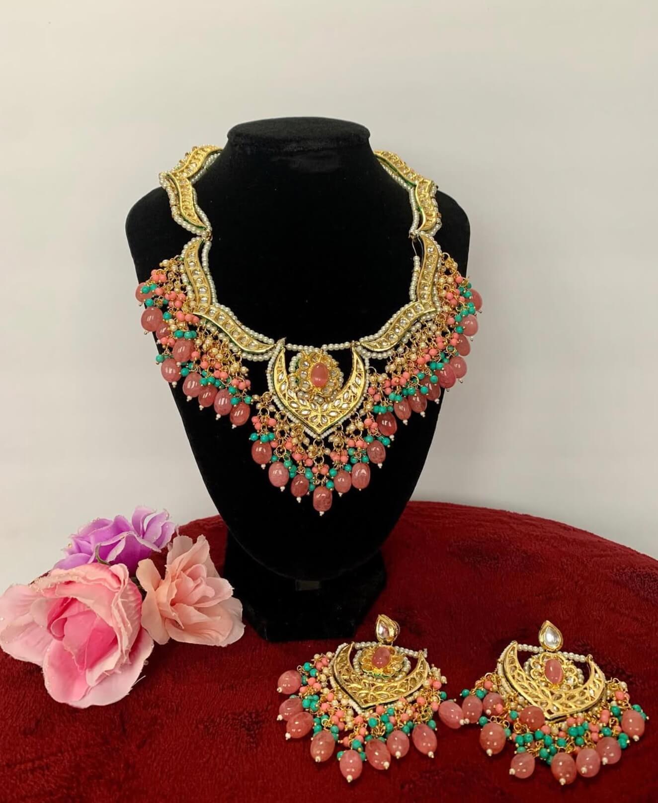 Bridal jewellery choker with white stones and floral motif from Mira Creations